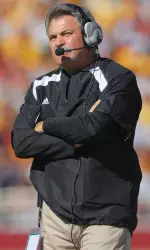 Coach Brown takes part in the weekly teleconference every Monday during the season.