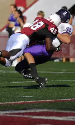 Last year David Burris sacked Dominic Randolph three times.