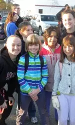 Women's basketball players Megan Zullo and Kim Benton with Wildwood students.