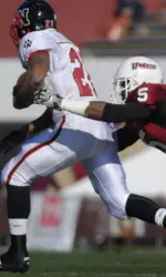 Jeromy Miles and UMass' defense held Northeastern to less than 150 yards of offense.