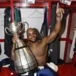 Keron Williams celebrates with the CFL Grey Cup.