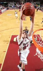 Gaffney not only reads defenses (jamming this one home after a steal) but also to South Hadley students.