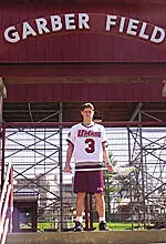 Brett Garber stands in front of his grandfather's field.