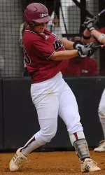 Whitney Mollica smashed her 200th hit in her 200th game to help the Minutewomen to a win over UConn.