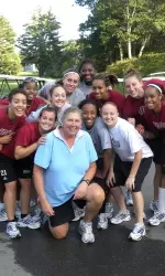 The UMass women's basketball team with head coach Marnie Dacko.