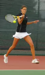 Julia Comas (above) and Magdalena Ploch combined for a win at No. 2 doubles.