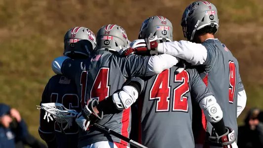 UMass celebrates the game-tying goal in 1 second left in the fourth quarter