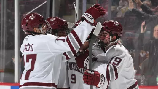 Team celebration vs. Northeastern