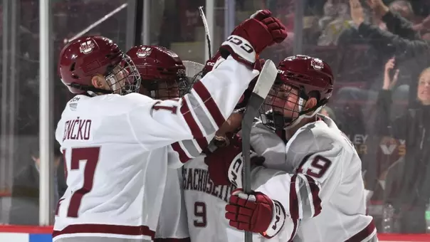 Team celebration vs. Northeastern