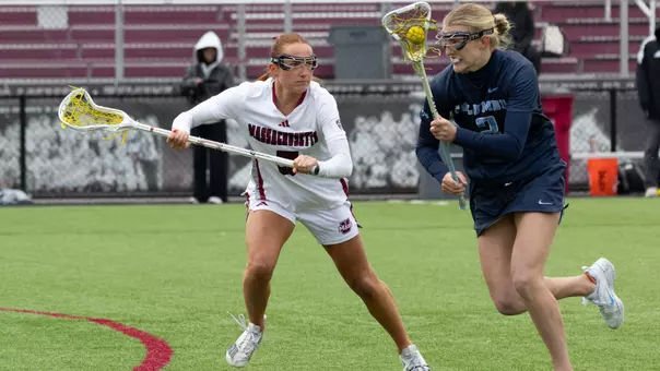 Bridget Valentine prepares to play defense against a Columbia attacker