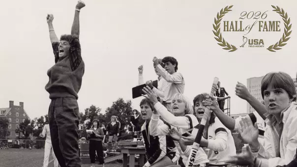 Pam Hixon USA Field Hockey Hall of Fame Logo in top right corner of action shot