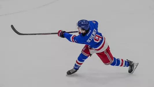 Barrett Dexheimer takes a slap shot