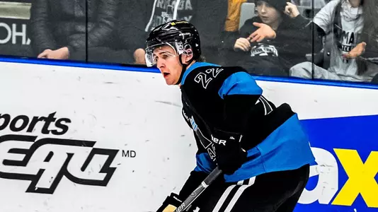Mathieu Taillefer in black and blue jersey on the ice