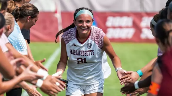 Annie McCaffrey runs through line of teammates as starters are announced