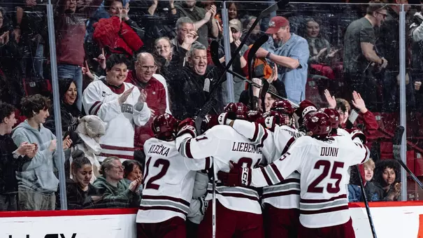 Team Celebration vs UConn - on the ice huddle