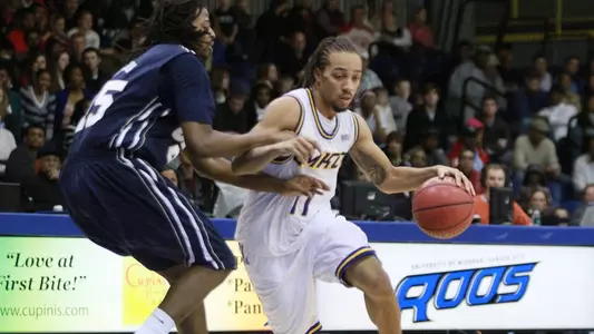 Short-handed 'Roos Battle, But Fall to Golden Eagles 72-65