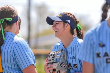 UMKC Softball player smiles during pregame
