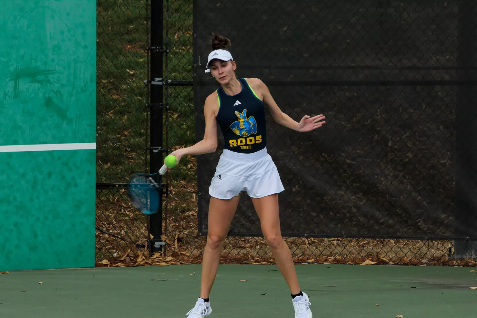 Anastassiya Timofeyeva swings through a forehand during her No. 6 singles match against South Dakota. Timofeyeva was unable to come away with the victory.