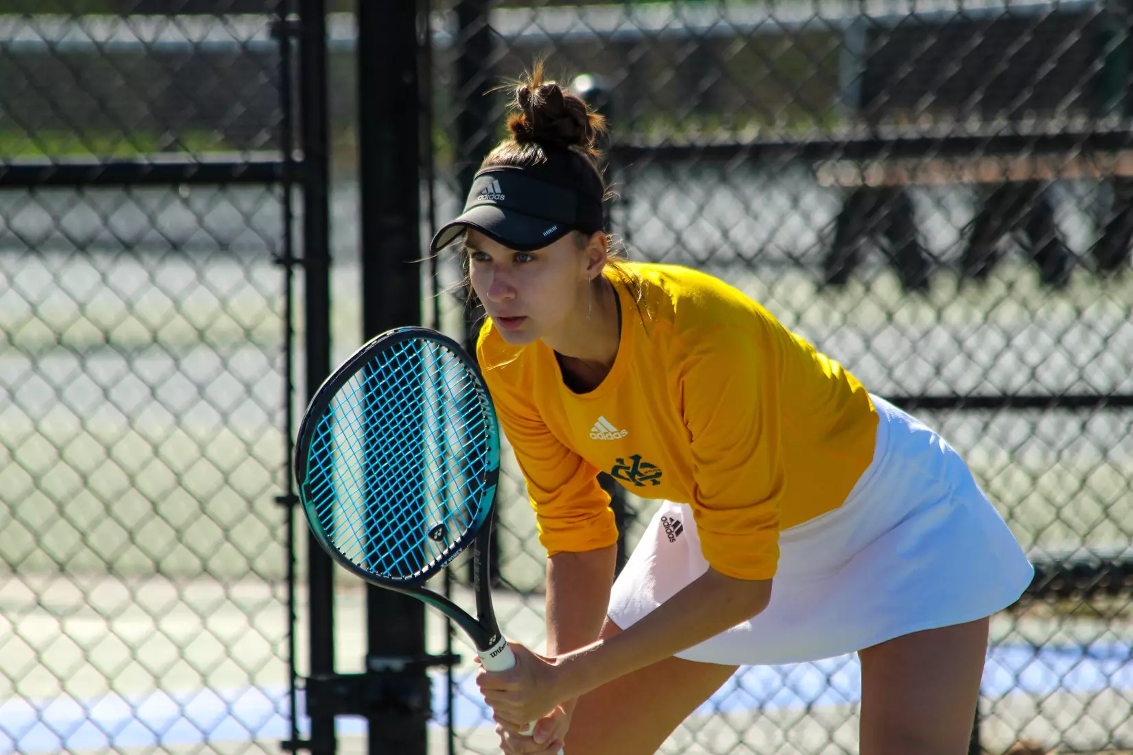 Anastassiya Timofeyeva gets ready to receive a serve during her No. 3 doubles match against North Dakota.