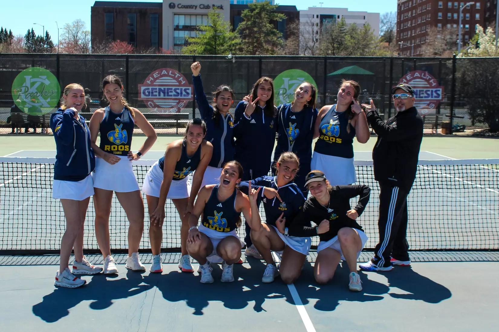 KC Women's Tennis strikes a pose after taking down North Dakota, 6-1.