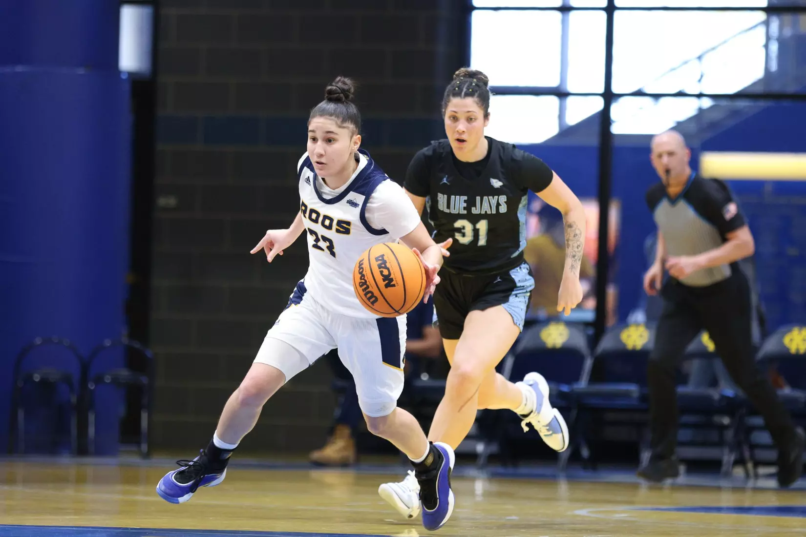 Kansas City Women's Basketball defeated Westminster 103-49 in its final game of non-conference play. Elauni Bennett earned her second double-double of the season, bringing down a team-high 21 rebounds and scoring 11 points.
