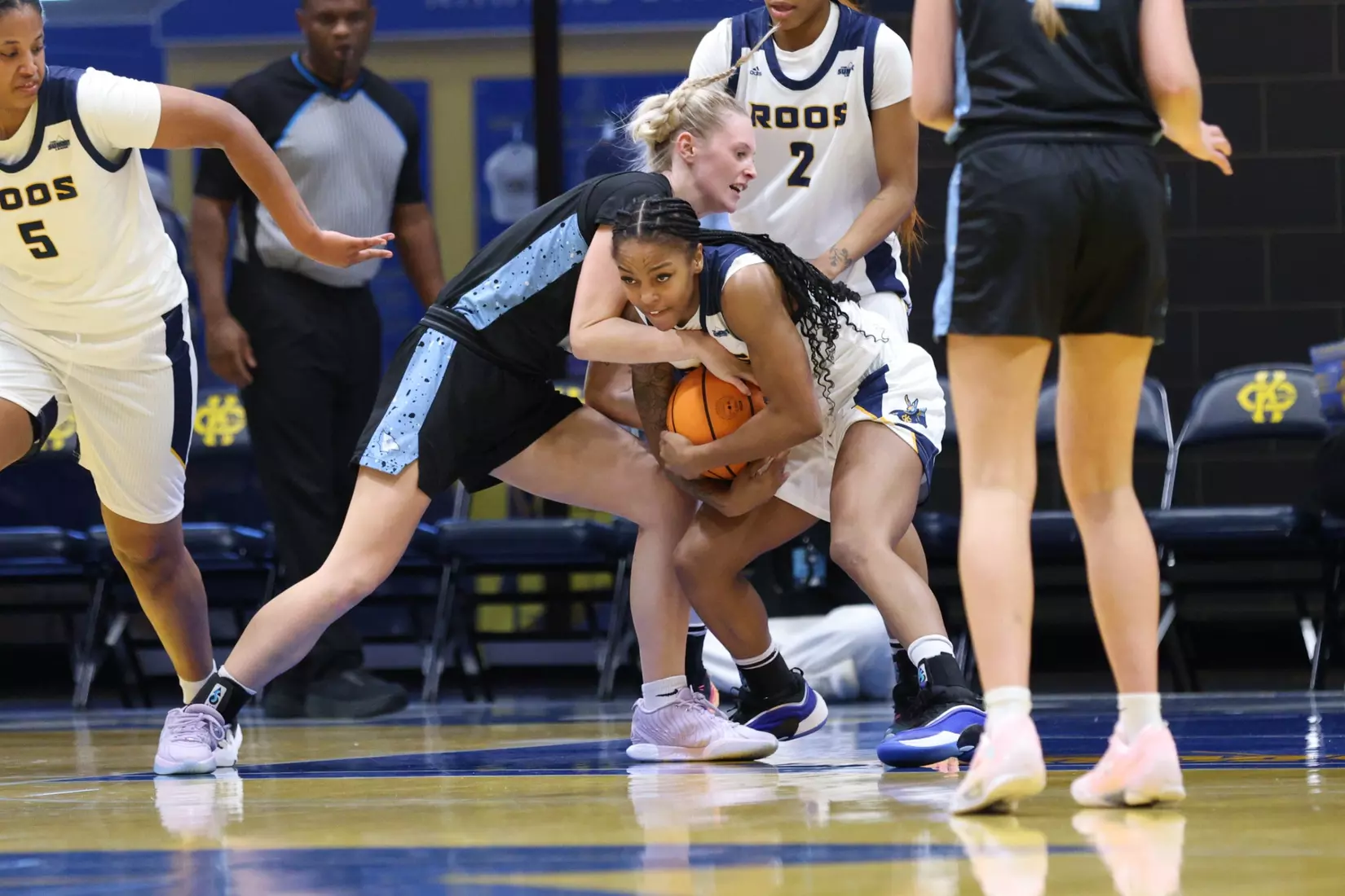 Kansas City Women's Basketball defeated Westminster 103-49 in its final game of non-conference play. Elauni Bennett earned her second double-double of the season, bringing down a team-high 21 rebounds and scoring 11 points.