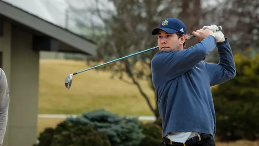 Mugnier Watches the Ball Soaring through the air