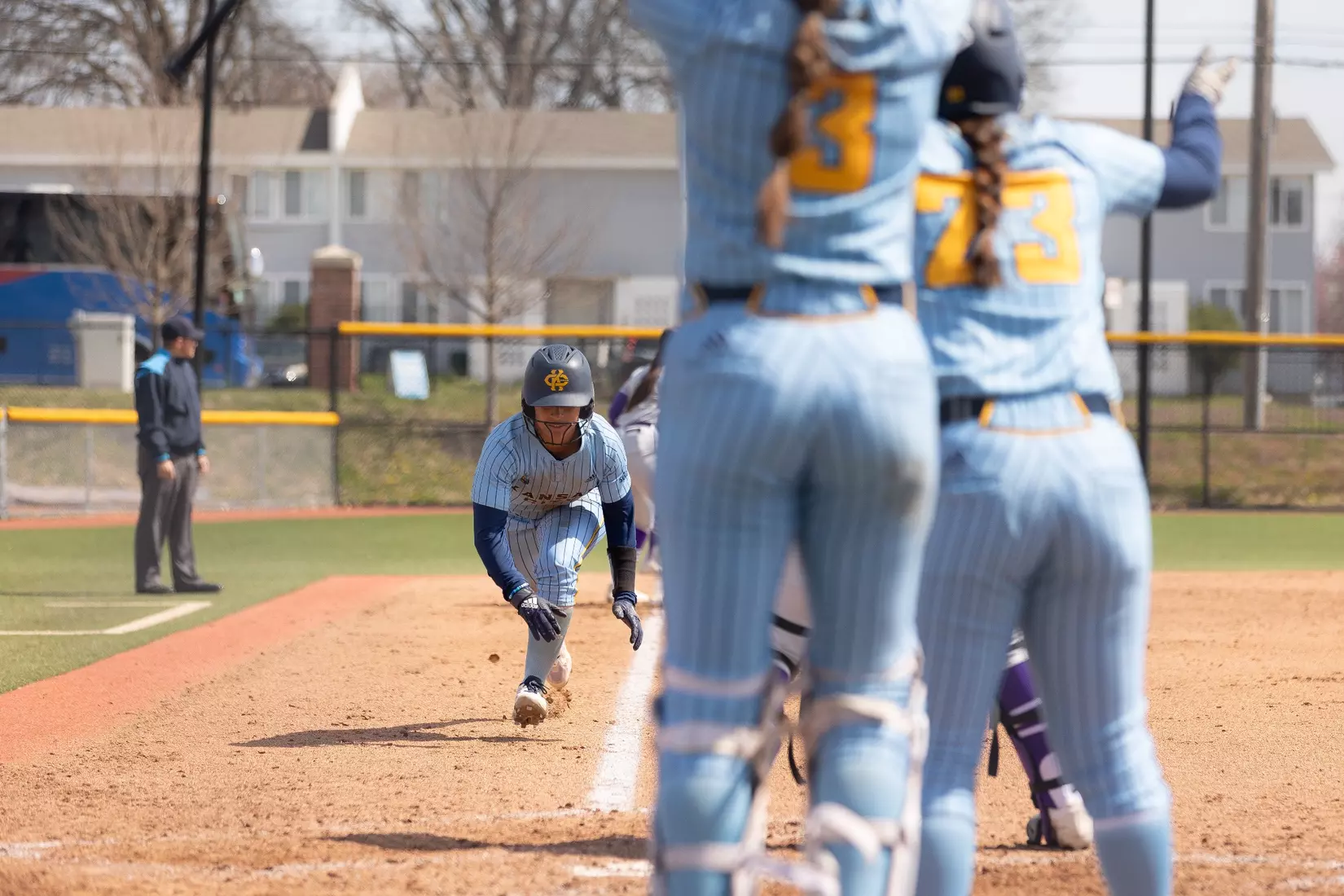 Kansas City Softball opened conference play by splitting a doubleheader with St. Thomas on March 23, 2024. The Roos won the first game, 3-2, and lost the second game, 8-1.