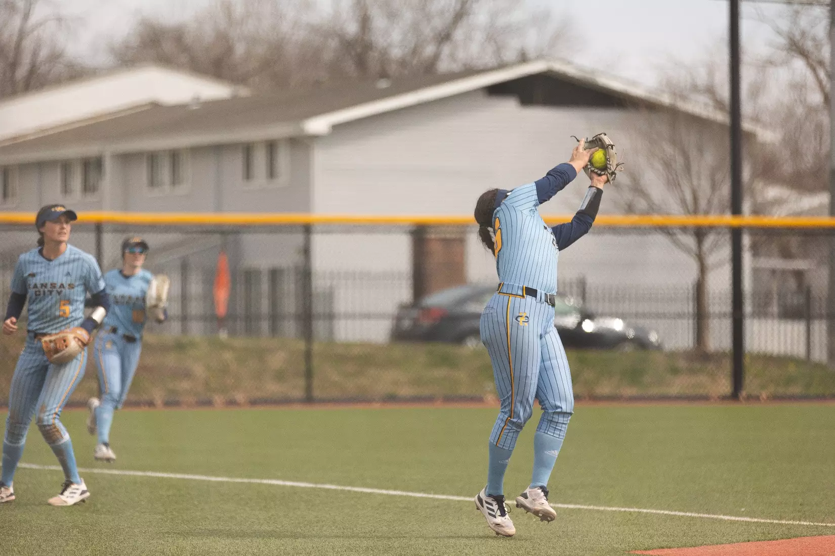 Kansas City Softball opened conference play by splitting a doubleheader with St. Thomas on March 23, 2024. The Roos won the first game, 3-2, and lost the second game, 8-1.