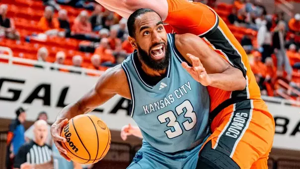 Jerome Palm battles inside with an Oklahoma State defender. Photo courtesy of OSU