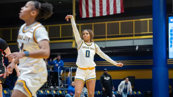 Emani shot with credit