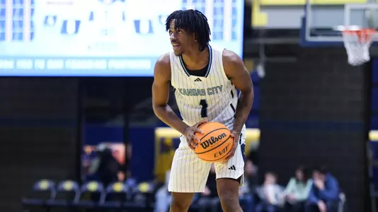 Jayson Petty Holds the Ball in a game against Omaha