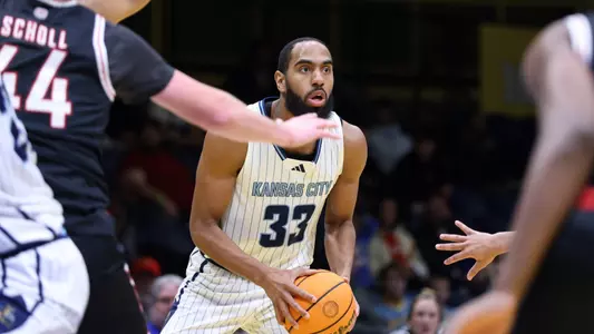 Jerome Palm looks to make a pass in the Roos' game against Omaha.