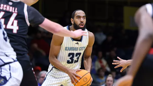 Jerome Palm looks to make a pass in the Roos' game against Omaha.