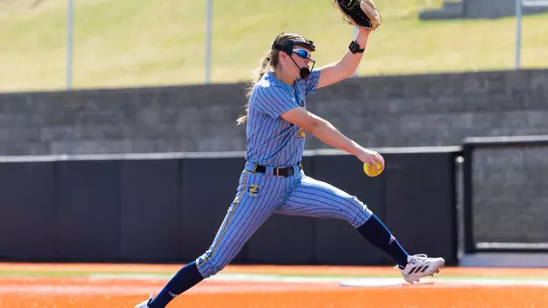 Katie Noble winds up to throw a pitch against the Omaha Mavericks.