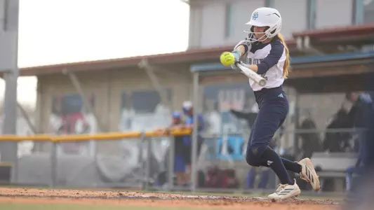 Ella Husak goes for a slap hit single against Creighton