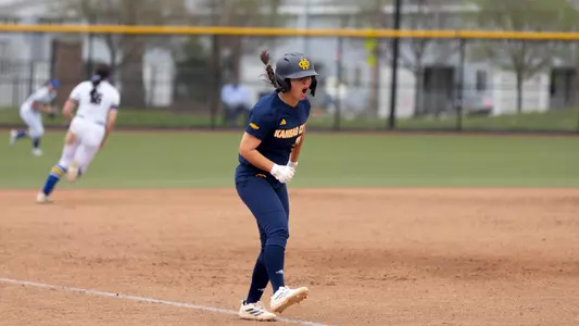 Elleana Navarro celebrates as she runs down the third base line to score a run in the Roos' 10-4 win over South Dakota State