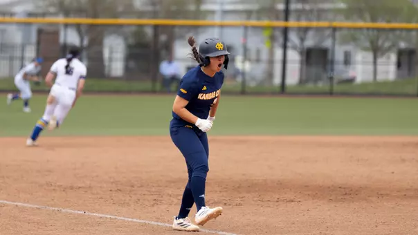 Elleana Navarro celebrates as she runs down the third base line to score a run in the Roos' 10-4 win over South Dakota State