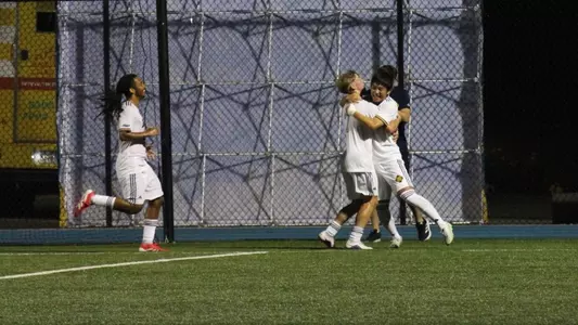 Shotaro Kodama embraces Bryce Outman after scoring the game-winning goal against UNLV