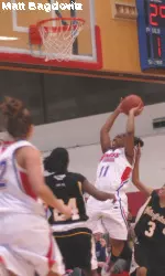AIC Late Show Stuns UMass Lowell, 63-59, in NE-10 Tournament First Round Image