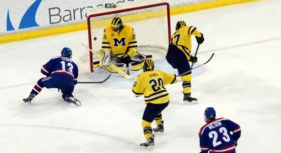 Adam Chapie scores the game-winner against Michigan