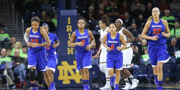 Team running to bench