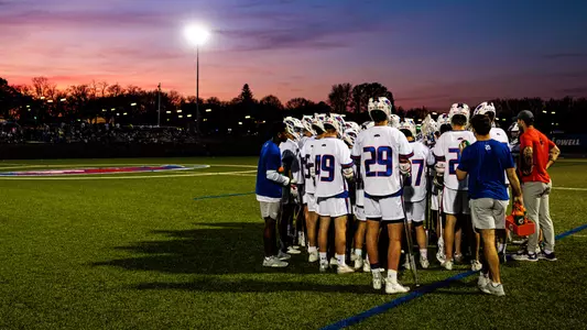 Men's lax huddle