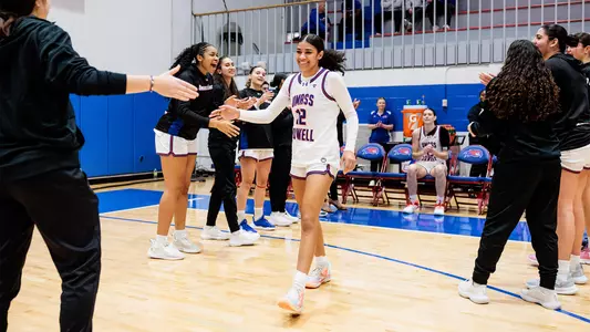 WBB_Maddie Rice_Starting Lineup_High Five_vs Saint Anselm