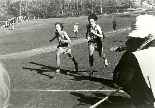 Vinnie Fleming crossing finish line to win 1975 national championship.