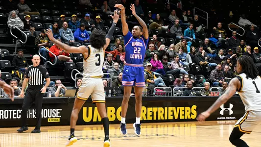 Farmer Shooting Three-Pointer at UMBC