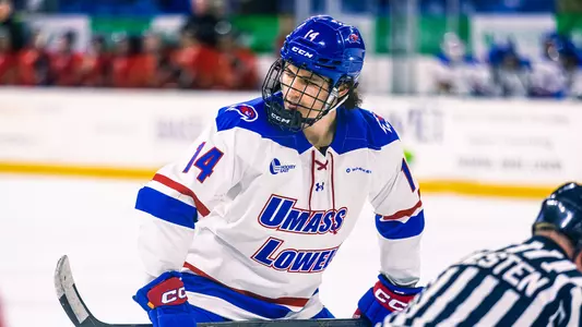Dalyn Wakely with stick across his body before faceoff