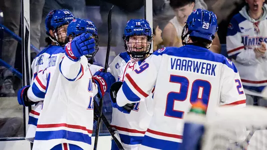 Arizona State Hockey Preview Photo. Group Of players celebrating goal