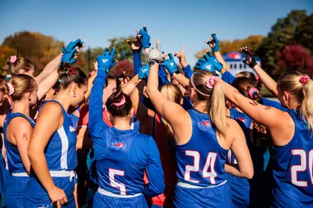 Field Hockey team huddling