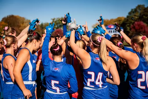 Field Hockey team huddling